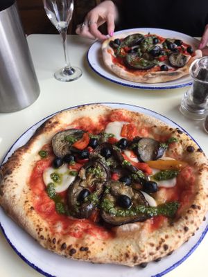 Aubergine, peppers and olives pizza at PLY in Manchester