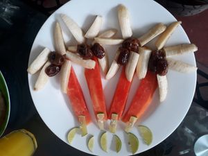 Palm trees fruit plates at Susu Vegan Kitchen in Unawatuna