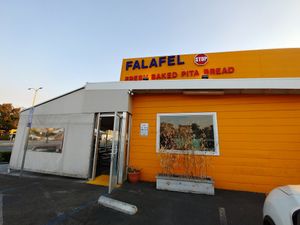 Front: about 10 parking stalls in the parking lot. at Falafel Stop in Sunnyvale