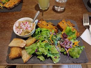 Vegetable terrine with herby houmous and salad at Petit Biscuit Et Gourmandise in Puy-leveque