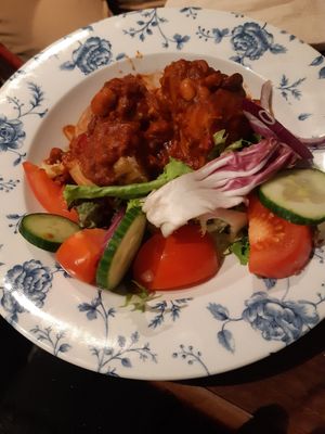 Baked potato with five bean chilli at The Silver Penny in Dublin