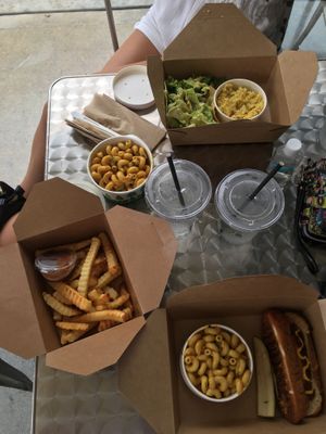 Tempeh walnut tacos with yellow rice,a "hot dog” and Smokey Mac and cheese with oven baked fries.  at Green Culture in New Port Richey