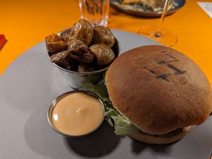 Vegan burger with mushrooms. Side of crispy new potatoes and sauce. at Midgard Restaurant & Bar in Hvolsvollur