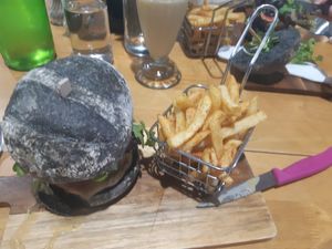 Falafel burger with fries at The Healthy Hub Cafe in Cairns