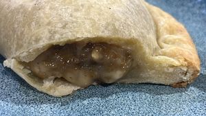 Mushroom empanada. Really good. And filling!!  at The Healthy Hub Cafe in Cairns