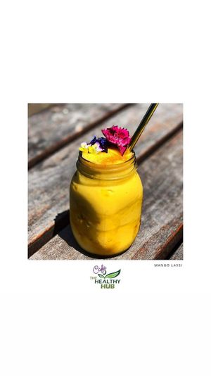 Mango Lassi Smoothie - organic mango, fresh coconut milk & coconut nectar 👌 at The Healthy Hub Cafe in Cairns