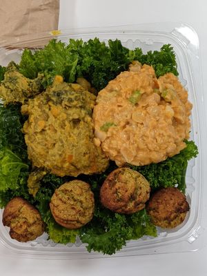 Greens Bowl, buffalo chickun salad, falafel and curry lentils at Greens and Grains in Middletown