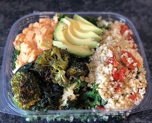 Kale Trio salad with buffalo chickpea salad, roasted broccoli & kale and quinoa salad + avocado at Greens and Grains in Middletown