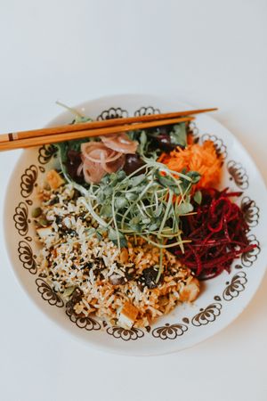 Abundance Bowl: warm brown rice in a chili peanut sauce, smoked tofu, roasted mushrooms and organic fresh greens  at Yayu in Ucluelet