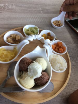 Vanilla, coconut and chocolate ice cream flavors with many toppings - sweet potato, pumpkin, pineapple, peanuts at Lamai Coconut Ice Cream in Koh Samui