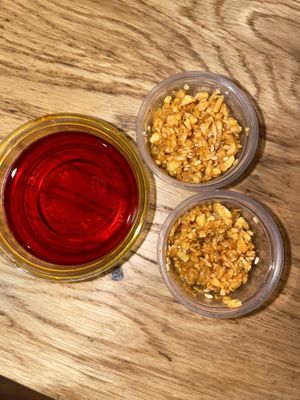 Chili oil and crispy garlic ( must ask for this ) 😋 🤤   at Hinodeya Ramen - Downtown in San Francisco