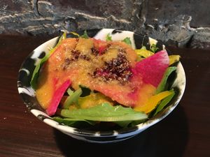 Hinodeya Salad - (half order) mixed greens, red quinoa topped with wonton and bonita flakes. Comes with Japanese dressing.  at Hinodeya Ramen - Downtown in San Francisco