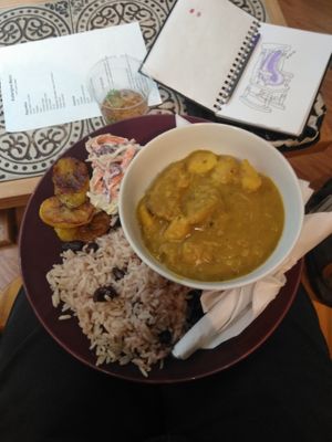 Vegan curry mutton with rice and peas coleslaw and fried plantain. Was very nice. at Aubergine in Cardiff