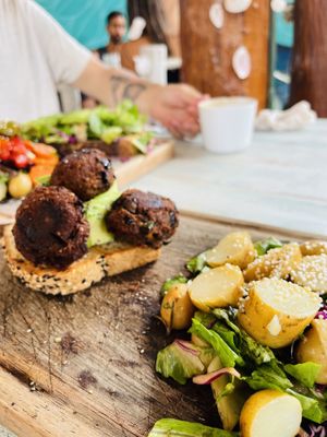 Toast with avocado and eggplant meatballs (vegan)  at Painapol in Holbox