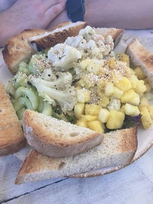 Salad with pineapple, cauliflower and cucumber  at Painapol in Holbox