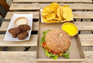 Beyond meat burger and nachos with cheese fondue and falafel with tahini sauce at VegaSpix in La Ciotat