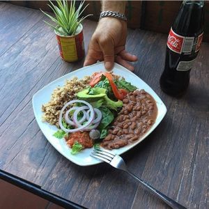 Chick'N enchilada with brown rice and pinto beans  at Leonor's Mexican Vegetarian Restaurant in Studio City