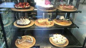 Vegan options are visibly marked with green dots on the signs  at AmaZone Cafe in Moliets