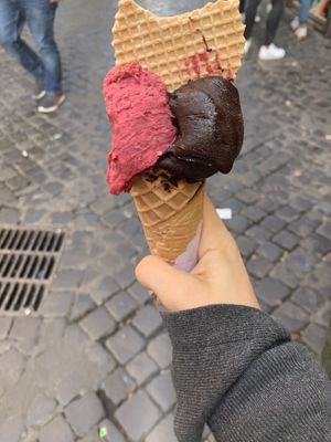 Vegan cone (along with the conny topping) and 2 balls of vegan ice cream flavours: mix of berries and dark chocolate at Gelato Artigianali in Rome