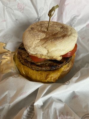Egg, cheese and sausage on grilled English muffin at Bubbie's - Plant Burgers at Plant Food Lab in Washington
