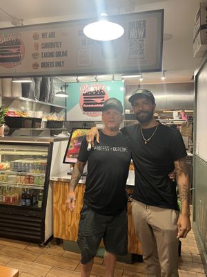 met @johnjosephdiscipline ! chris is a big fan! i learned who he was & i’m impressed by his work! he was grabbing take out! he loves bubbies as well!  at Bubbie's - Plant Burgers at Plant Food Lab in Washington