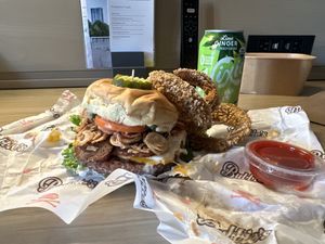 Pretty Burger, onion rings, and sparkling water  at Bubbie's - Plant Burgers at Plant Food Lab in Washington