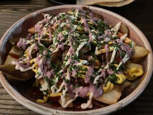Salchipapas (Peruvian loaded fries) - So good! at Mongrel in Milton