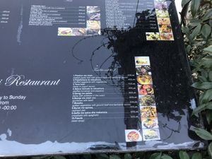 Bottom right corner of menu at Onhezmi in Sarande