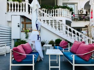 Seating at Onhezmi in Sarande