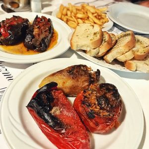 Stuffed veggies, bread, fries at Onhezmi in Sarande
