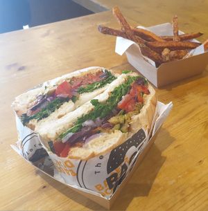 Super Veggie bagel with sweet potato fries at Bagel Road in Verona