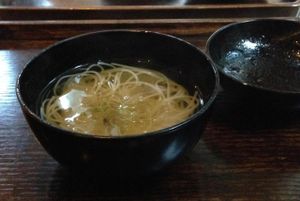 Second course - clean broth with noodles at Kajitsu in New York City