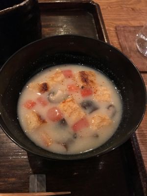 Miso soup with mushrooms, carrots, and fried tofu at Kajitsu in New York City