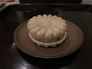 Sesame tofu inside some crackers  at Kajitsu in New York City