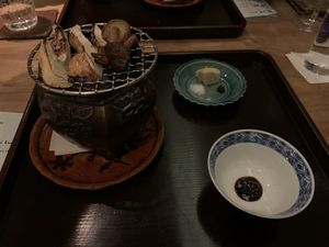 Grilled mushrooms to dip in chili and homemade soy sauce with Szechuan-like peppercorns at Kajitsu in New York City