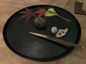 Mochi, green tea sweet thing, candied lotus root at Kajitsu in New York City
