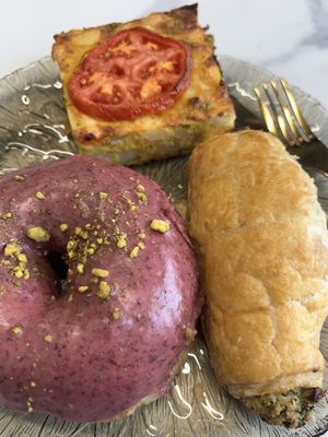 Blueberry lemon donut, frittata, and spinach roll  at Canela in Calgary