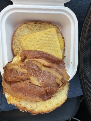 Breakfast sandwich w/ bacon, cheese & egg  at Canela in Calgary