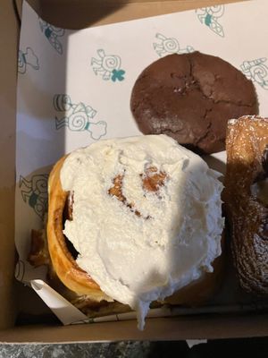 Cinnamon bun and chocolate cookie at Canela in Calgary