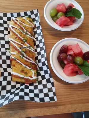 Vegan omelette and fresh fruit at Spoiled Vegans Cafe in San Diego