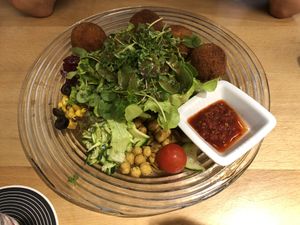 We had a salad with homemade falafel balls. It was very delicious. We asked for a vegan dressing, which was no problem. The service was friendly and attentive.  at Eisenbeiz in Frauenfeld