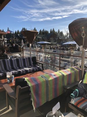 Awesome outdoor seating. Bench seats, and open seating around a fire pit with live music. at Azul-Latin Kitchen in South Lake Tahoe