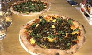 Great vegan pizzas!!! Amazing DF cheese, pizza at the back has kale + avo and the one at the front with mushrooms!  at Miss Lucy's Woodfired Pizza and Bar in Queenstown