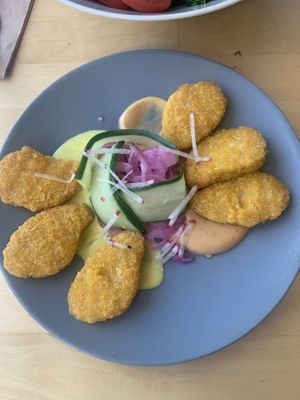 Nuggets with cheese style sauce, perfect for savory cravings!  at Rohe in Tallinn