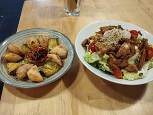 Dumplings (left) and cesear salad (right) at Rohe in Tallinn