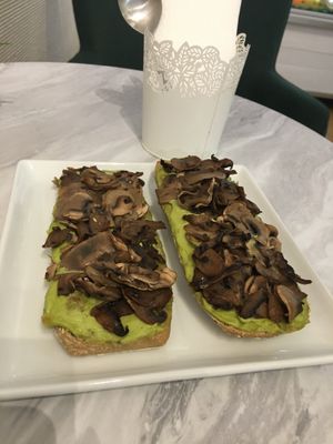 Avocado cream and mushrooms on toast at Club Life in Porto