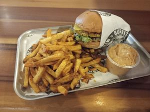 Vegan smash burger and seasoned fries with vegan chipotle sauce at Burrito Loco in Letterkenny