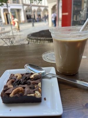 Iced oat late, vegan brownie  at Racoon Coffee & More in Alesund