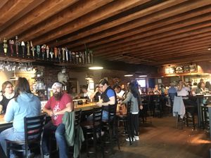 Inside bar. But lots of tables / booths available too   at Three Dollar Deweys in Portland
