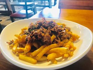 Vegan poutine   at Three Dollar Deweys in Portland